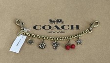 NWT COACH Chain Bag Charm Crystal Motif Bow Cherry Flower Brass Multi CCX41