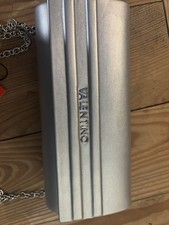 Valentino Bags Sofie silver clutch bag, featuring a metallic finish