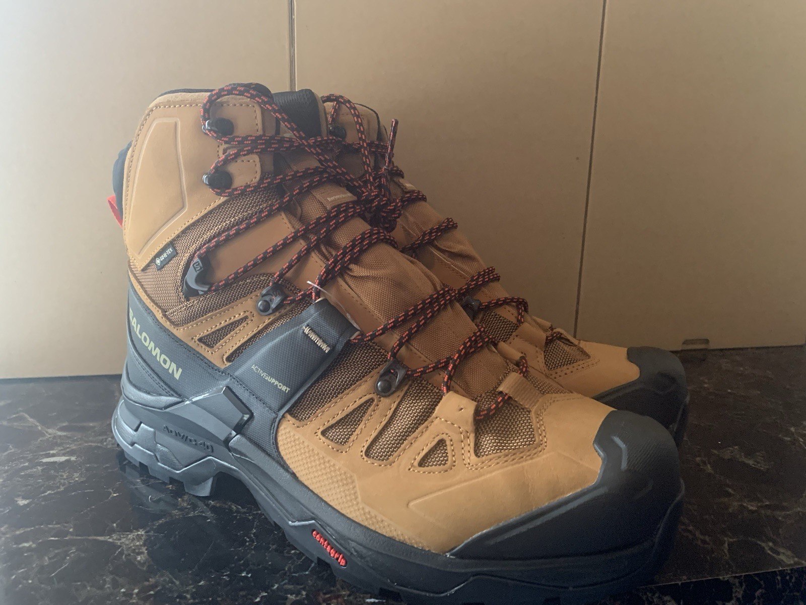 Stivali Salomon Quest 4 GTX GoreTex da trekking marrone nero da uomo taglia US 11