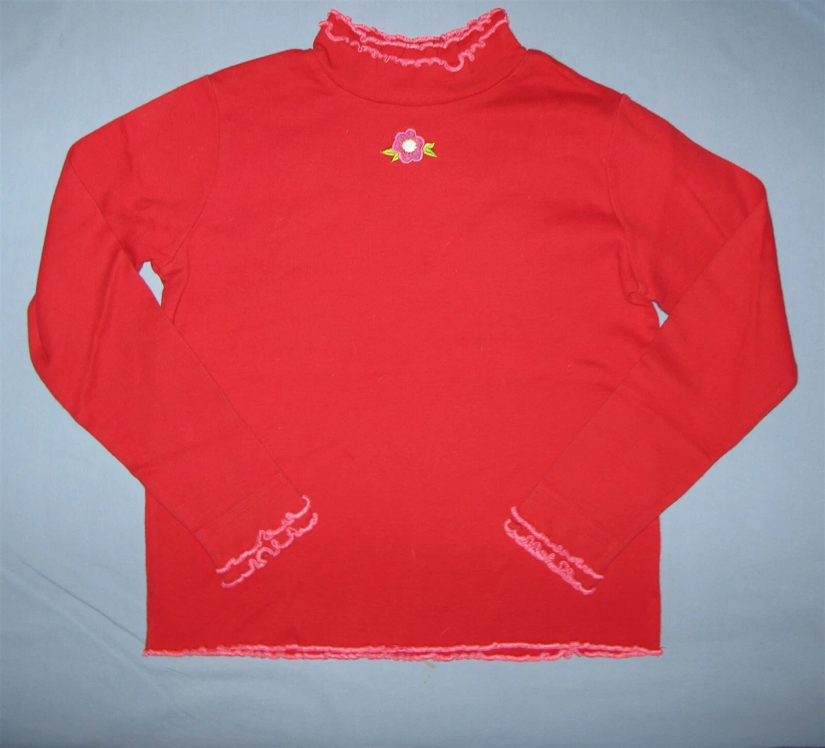 Embroidered top mock turtleneck