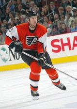 Mike Rathje Philadelphia Flyers skates at the NHL game with - Ice Hockey Photo 2