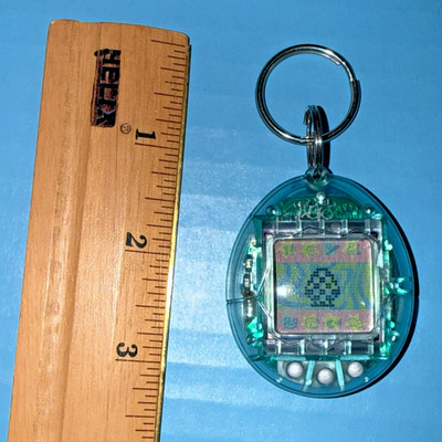 Vintage Bandai 1997 Tamagotchi Clear Sky Blue Digital Virtual Pet