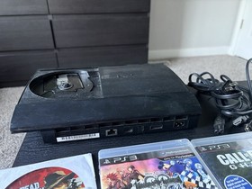Sony PS3 Super Slim 250GB CECH-4001B Console Bundle + Camo Controller & 8 Games