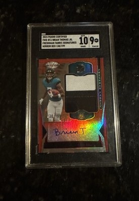 2024Certified - Freshman Fabric Brian Thomas Jr. #Mirror Red /199 (AU, MEM, RC)