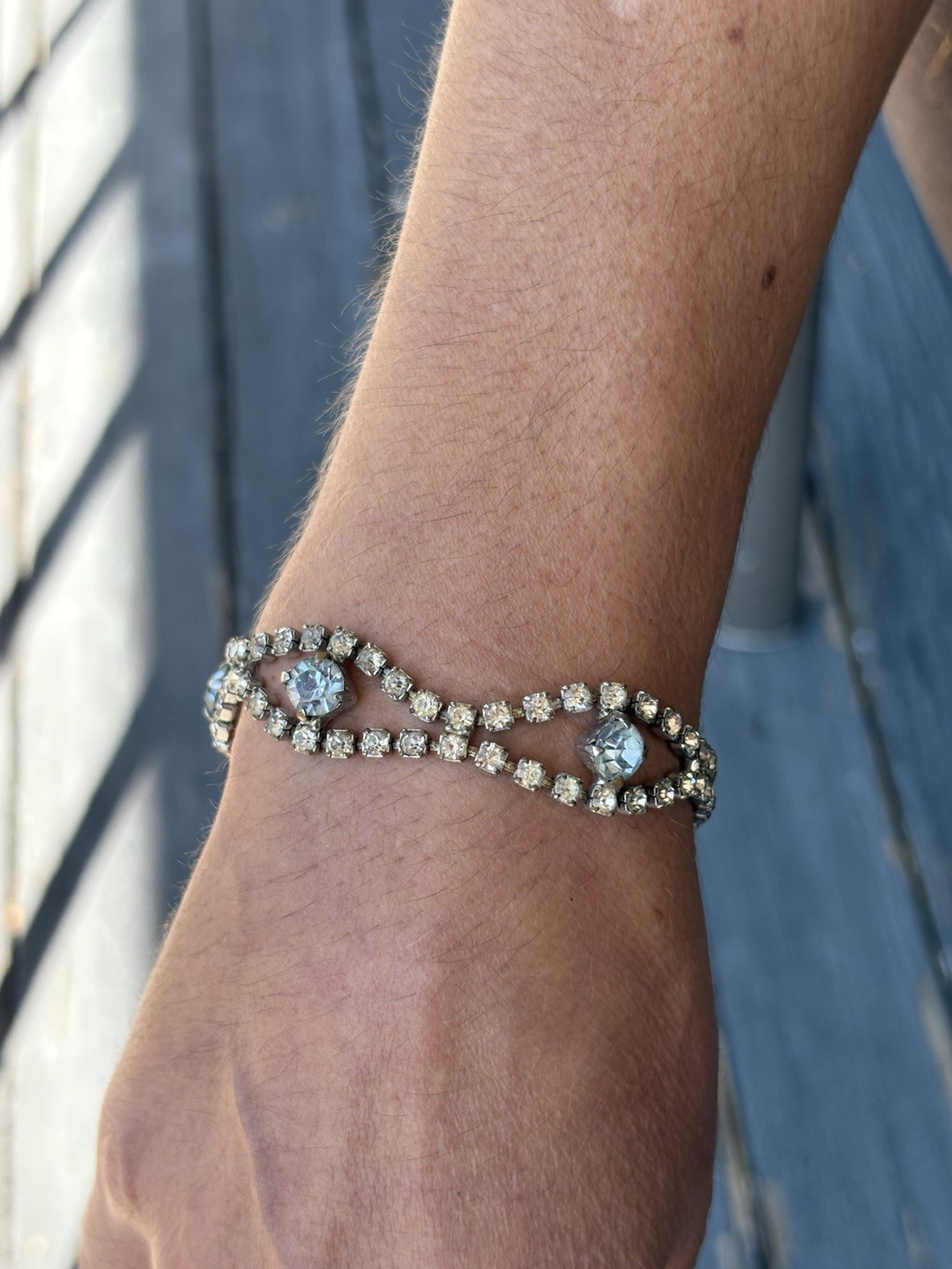 Vintage silver tone clasp bracelet with clear and blue rhinestones