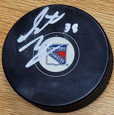 Autographed STEVEN FOGARTY New York Rangers Hockey Puck - w / COA
