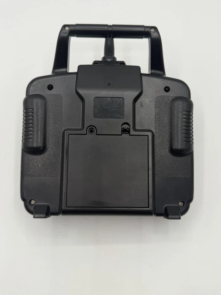 Transmisor de control remoto Syma 2.4G RC probado funciona compartimento de batería limpio Foto 2 de 4