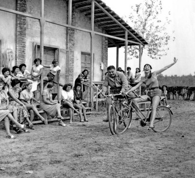 Italian actors Elsa Martinelli Folco Lulli enjoying on bicycle dur- Old Photo