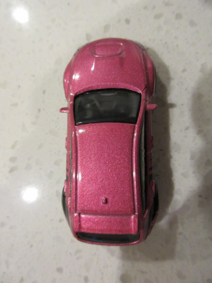 Coche de carreras de juguete Hot Wheels Subaru WRX STI Pink Nightburnerz 1:64 Diecast 2011 Foto 3 de 4