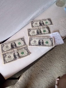 4 STAR NOTES * ONE HAS A LOW BACK NUMBER, A #2, ALSO TWO OFF CENTERED 1. BILLS