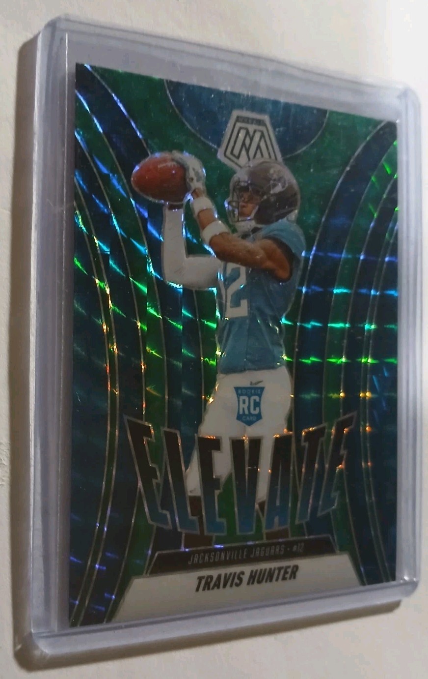 2025 Panini Mosaic - Elevate Travis Hunter #1 Green Mosaic Prizm (RC)