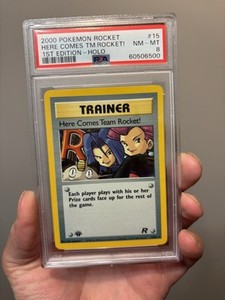 2000 Pokemon Team Rocket 1st Edition Here Comes Team Rocket Holo 15/82 PSA 8