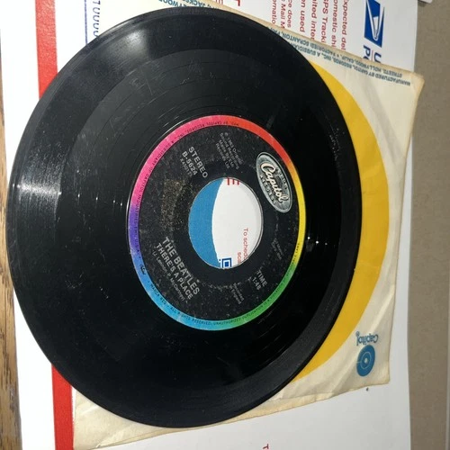 The Beatles, Twist and Shout / There's a Place vinyl 45 (US, Capitol, 1986) VG+