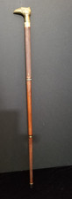 Walking Stick, Eagles Head, Brass and Wood, 35 inches long.