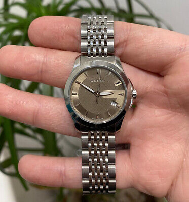 Gucci G-Timeless Stainless Steel 28mm Brown Dial Date Quartz Gucci G-Timeless Stainless Steel 28mm Brown Dial Date Quartz