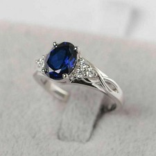 Lab Created Blue Sapphire 2.5Ct Oval Cut Halo Wedding Ring 14K White Gold Plated