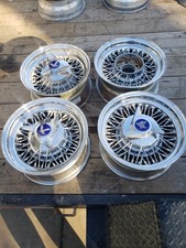 Set of 4 Roadster Chrome Wire Wheels With 5x4.75 Bolt Pattern 15 Inch 6 Wide.