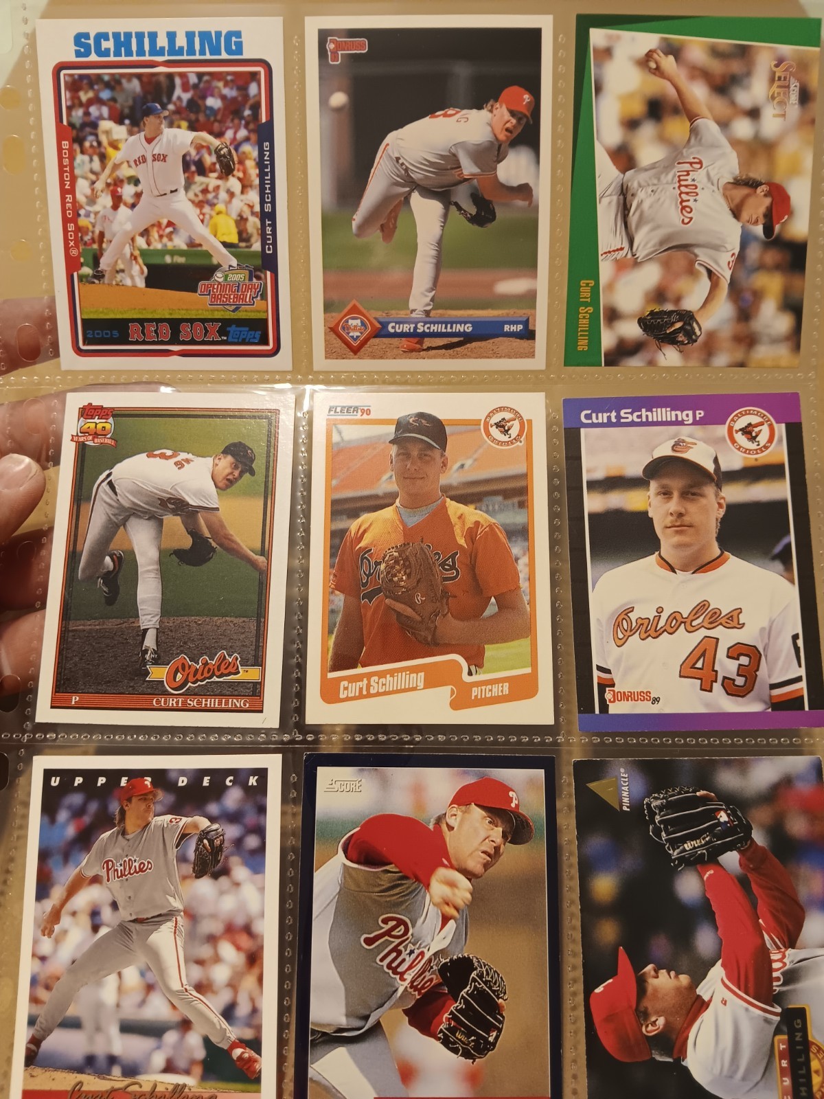 Lot of 9 Curt Schilling baseball cards Orioles Phillies Red Sox