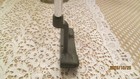 Black vintage PING Anser putter head with silver shaft on beige lace doily, marked “2026/10/25 Made in USA.”