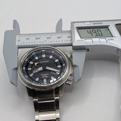 Citizen Eco-Drive B877-R005600 GMT Black Silver 200M Date Solar