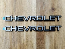 SET OF 2 - New Genuine GM OEM NOS CHEVROLET Nameplate Emblems SILVER & BLACK