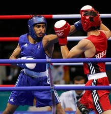 Amir Khan of Britain competes v Marios Kaperonis of Greece during - Old Photo