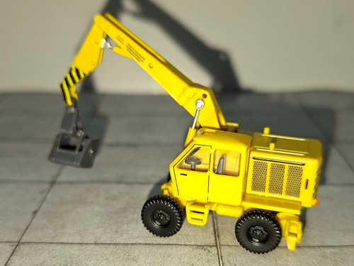 Busch 87401 - escala TT - excavadora móvil T-174-2 - pinza - cargadora Weimar - amarillo | Condition: Neu