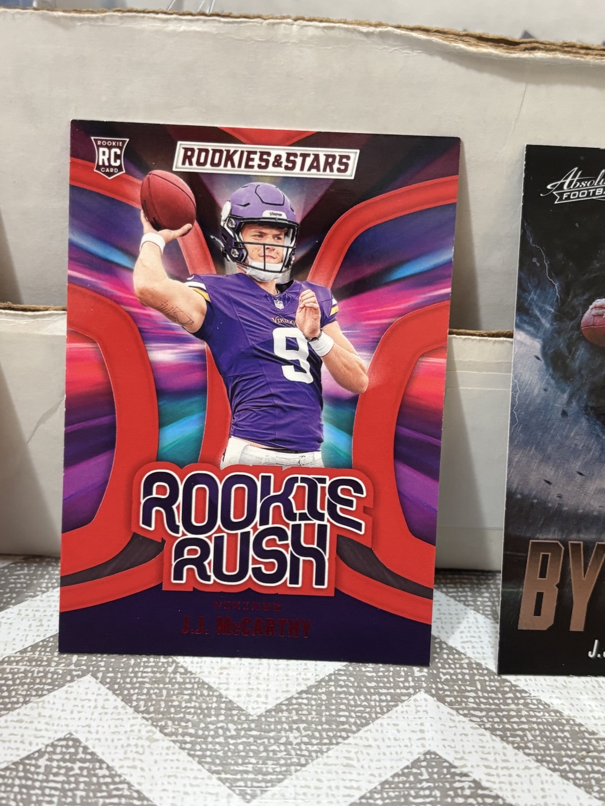 2024 Panini Rookies & Stars - Rookie Rush J.J. McCarthy #RR-JMY Longevity (RC)
