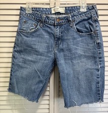 Levi  s Misses Cutoff Denim Jean Shorts Med Wash Size 8 Mid Rise Raw Hem Zip