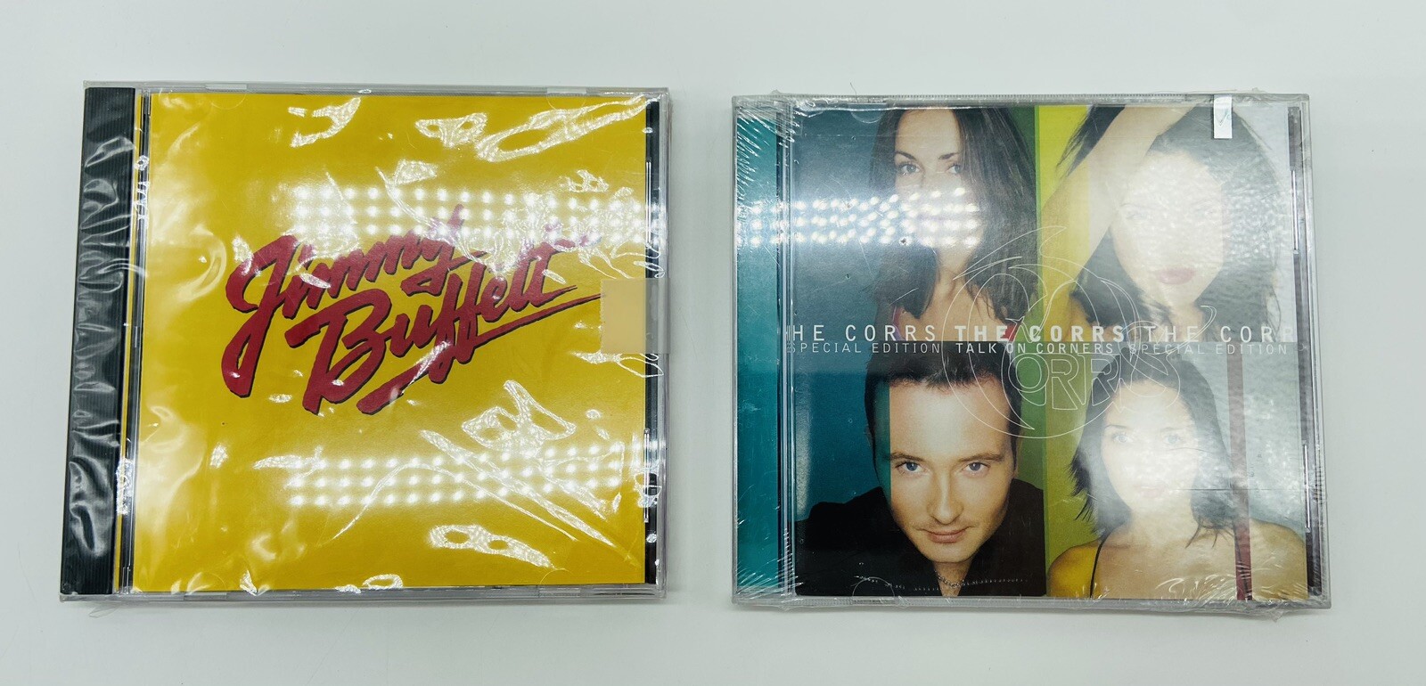 *NEW/SEALED LOT of 9 CDs* Jimmy Buffet/Celine Dion/Garth Brooks/Corrs/Cher thumbnail 2