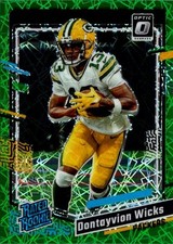 2023 Donruss Optic #249 Dontayvion Wicks Green Velocity Rookie Card RC Packers. rookie card picture