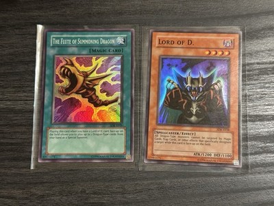 Yu-Gi-Oh NM SDK-E041- Lord of D. And SDK-E042 The Flute Of Summoning Dragon