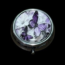 Lindo estuche organizador de píldoras de metal redondo portátil mariposa
