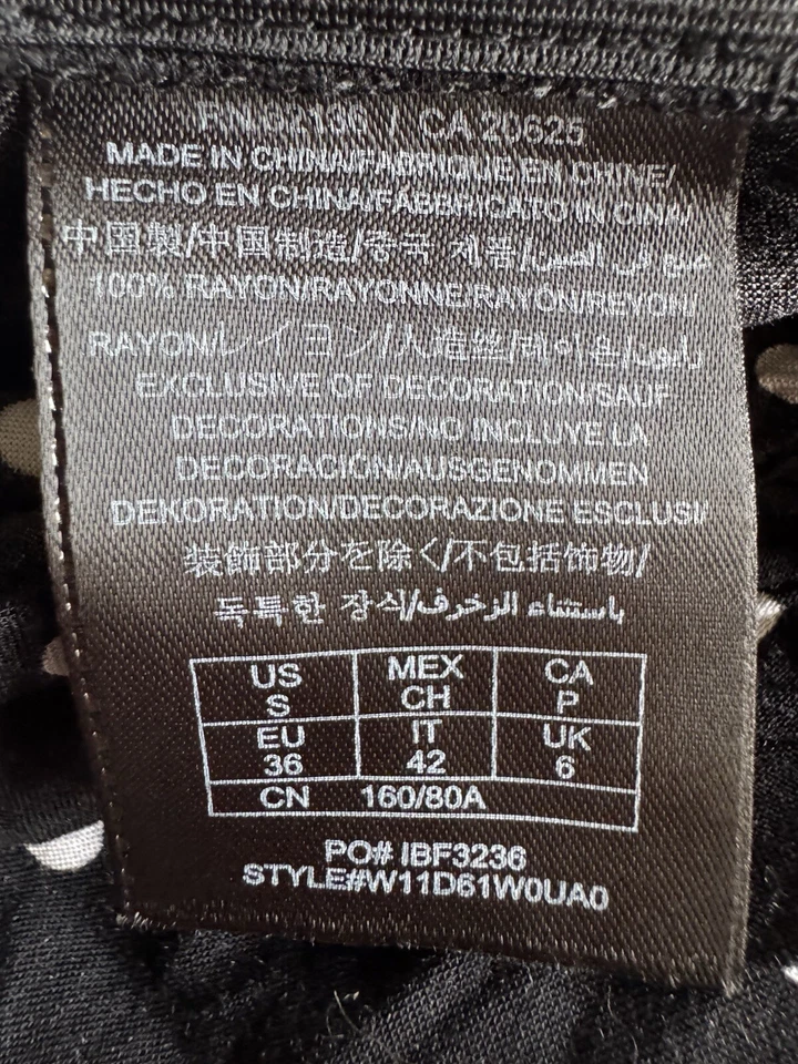 Pantalones cortos para mujer Guess Los Angeles negros a lunares talla pequeña Foto 4 de 4