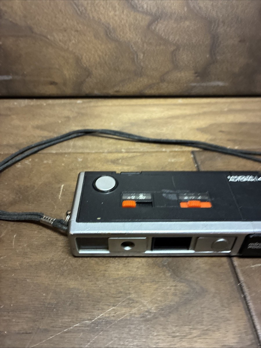 Minolta Pocket Autopak 450E - 110 Film Point & Shoot Side Flash 