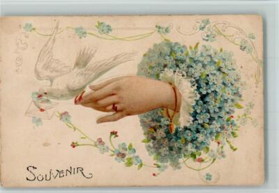 10500756 - One Hand with a Bracelet and Forget-Me-Not and a White