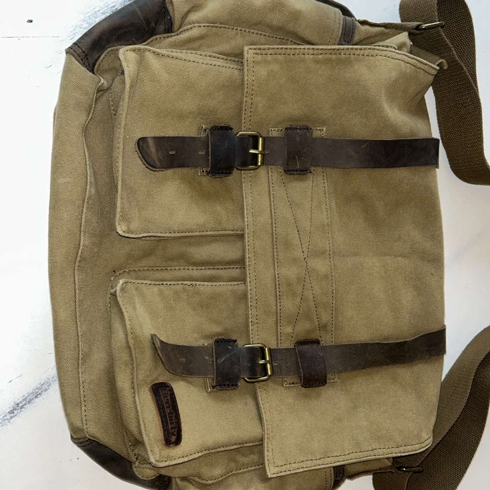 Bolso de viaje Berchirly de lona y cuero estilo militar mensajero para computadora portátil Foto 3 de 4