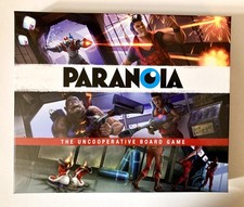 PARANOIA - THE UNCOOPERATIVE BOARD GAME Modiphius opened but unpunched