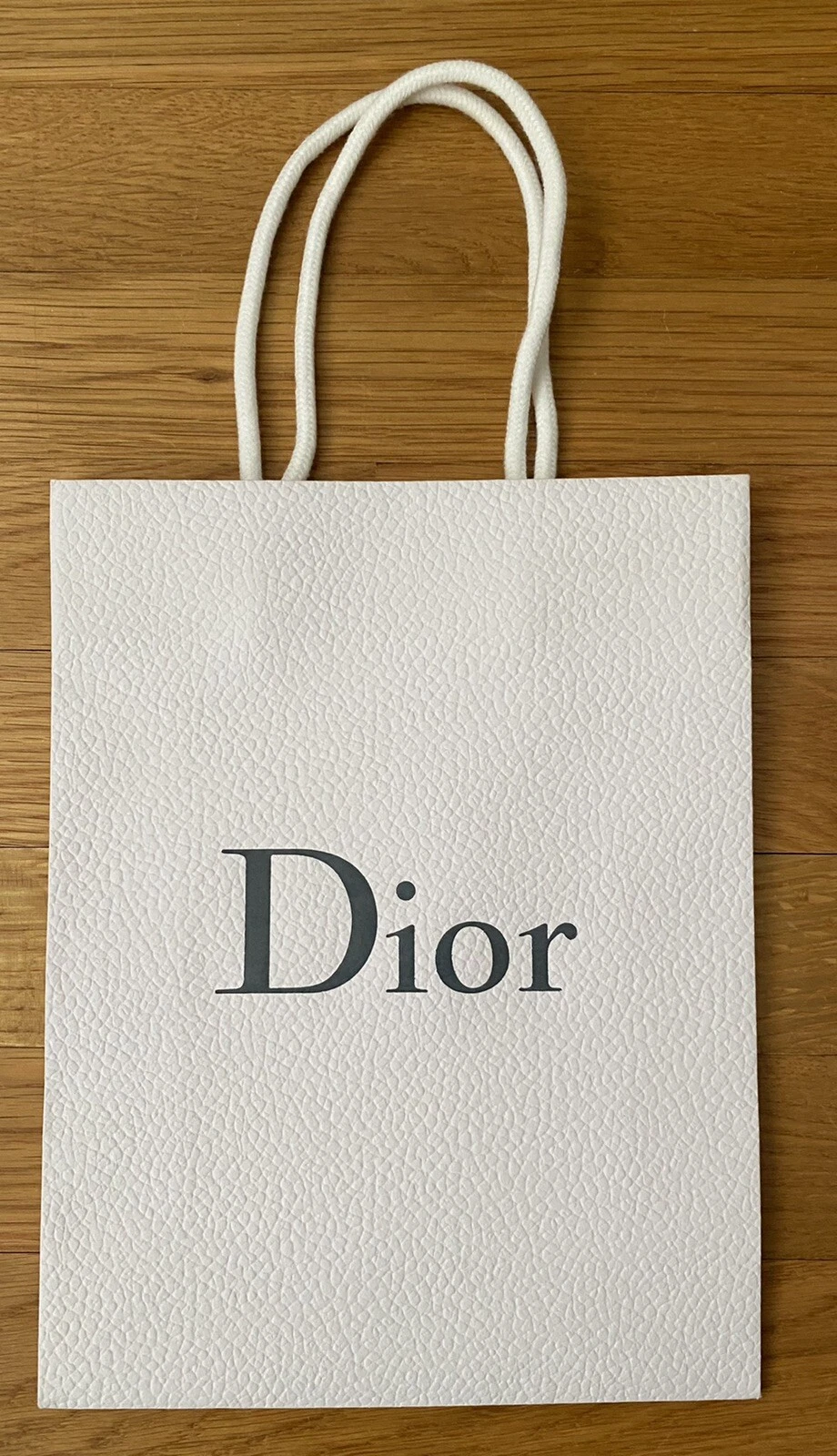 Petit sac cadeau en papier texturé blanc Dior neuf