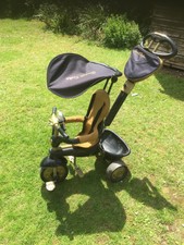 smart trike black and gold