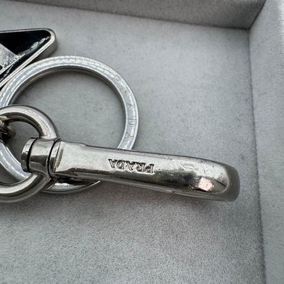 Prada Triangle Logo Keychain Black Silver Enamel Charm RFID Aura