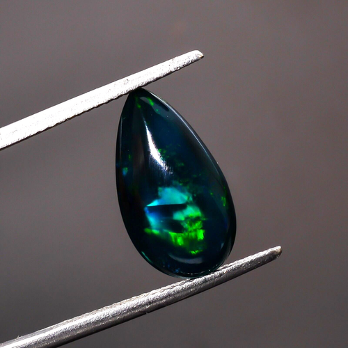 ES 2.915 ct. NEGRO OPAL NATURAL ETHIOPIA PERA CABOCHON MULTICOLOR