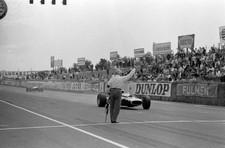 Chris Irwin BRM P83 passes an official who signals one lap to go - 1967 Photo