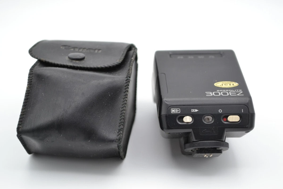 Canon Eos65035㎜～70㎜ スピードライト 300EZ付カバー付き Junk] 324 yen flash. Can it be used with EOS digital cameras