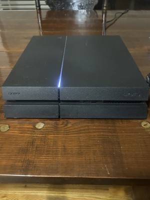 Sony PS4 (500 GB)Console - Black. 1 Controller And Grand Theft Auto Five Game. X