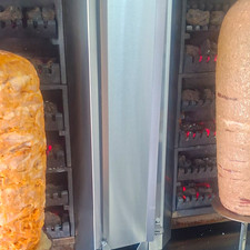Vertikaler Edelstahl Mangal-/Schaschlikgrill silber mit Rotisserie-Spieß