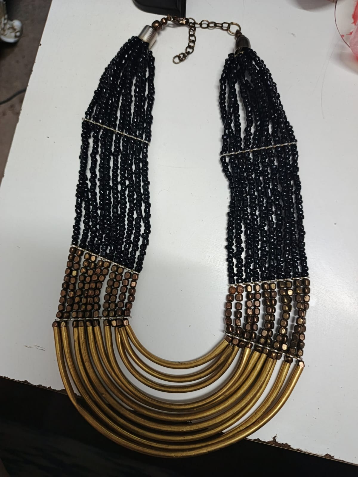 A bohemian-style beaded pectoral necklace, multi-layered, vintage, and handmade