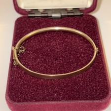 9ct gold child’s bangle with Bronze core approx 6.32g