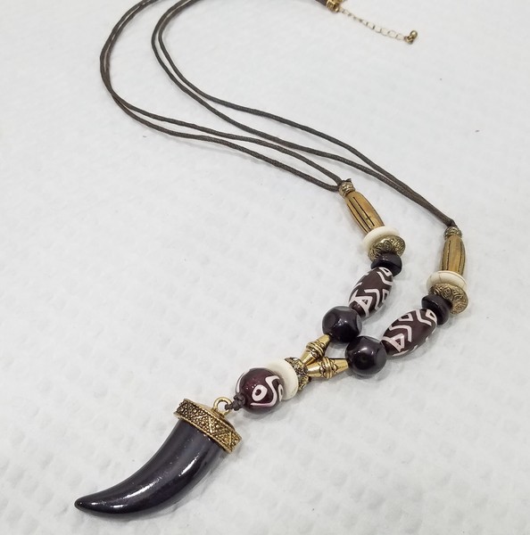 Alternate view of Tribal Ethnic Brown Acrylic Wolf Tooth Pendant Decorative Bead Cord Necklace