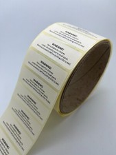 Printed warning labels text is changeable